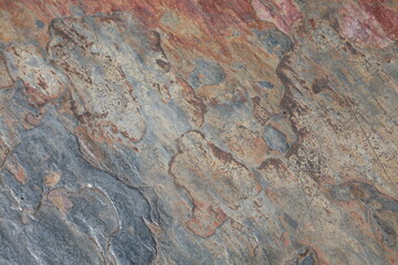 Beautiful slate stone tile natural background texture with gray, blue, orange, brown