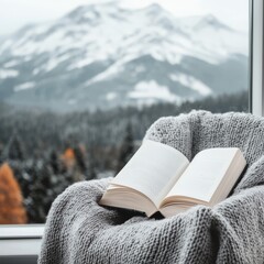 Cozy reading nook by the window with an open book and snowy mountain view