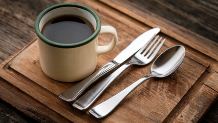 Obraz premium Rustic Table Setting with Coffee and Cutlery