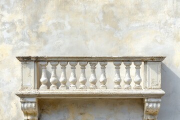 Elegant aged balustrade adorns a textured light colored stucco wall