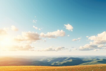 Obraz premium Scenic landscape at sunset with rolling hills and golden sunlight. Tranquil nature vista with distant mountains. Panoramic view of serene countryside. Copy space in sky.