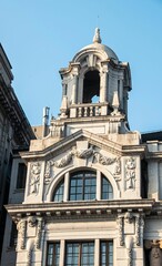 Fototapeta premium Detailed view of ornate historic building facade.