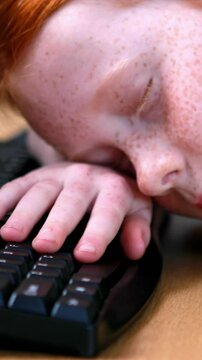 Little girl sleeping on keyboard