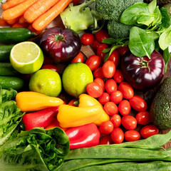 Assortment of fresh organic vegetables in rainbow colors.