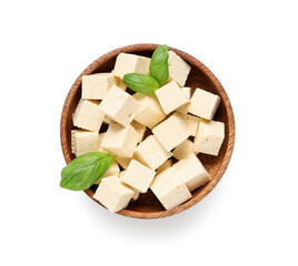 Bowl with pieces of tasty tofu cheese isolated on white background