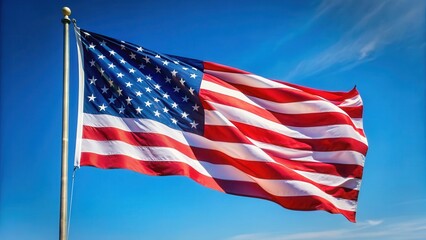 Fototapeta premium Patriotic American flag waving in the wind with red white and blue colors against a clear blue sky on Memorial Day, Patriotic, Nature Background