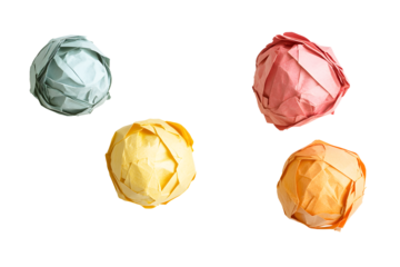 Crumpled sheet cycle balls multicolor blue, orange, pink, yellow paper against isolated on cut out PNG or transparent background. Image highlights textures and folds of paper, symbol waste, recycling.