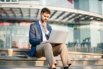 Young business man leader entrepreneur, professional manager holding digital tablet computer