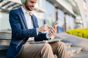 Young business man leader entrepreneur, professional manager holding digital tablet computer