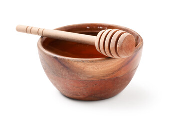Wooden bowl with tasty honey and dipper isolated on white background, closeup