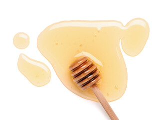 Wooden dipper with spilled honey isolated on white background