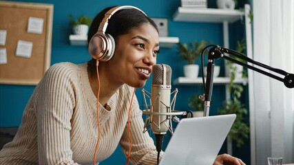Radiant Podcaster: A confident and smiling woman engrossed in the creation of a podcast, utilizing headphones and a microphone, against a backdrop of a cozy, modern workspace.