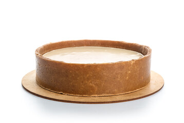 Sweet vanilla cheesecake on white background