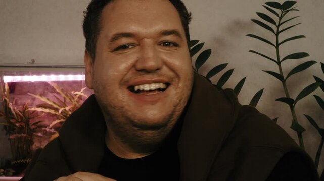 A cheerful man enjoys life.