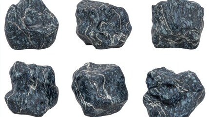 Obraz premium Collection of Irregular Shaped Black Rocks with Smooth Textures and Natural Luster