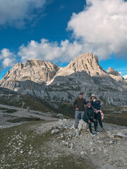 Hikkers group arrive at an out point look in the dolomites