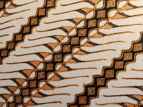 Batik pattern background.
A close up of Javanese batik with a Parang Tuding pattern. Indonesian batik.  