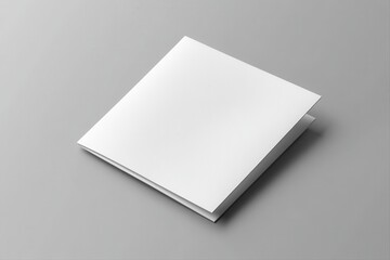 Creative concept blank white square paper on gray surface in minimalist studio