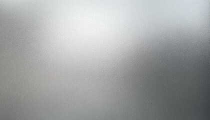 bright grainy metallic silver gradient aluminum texture abstract blurry monochrome frosted glass effect background
