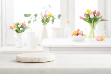 Marble round podium and table on blurred Easter kitchen decoration background