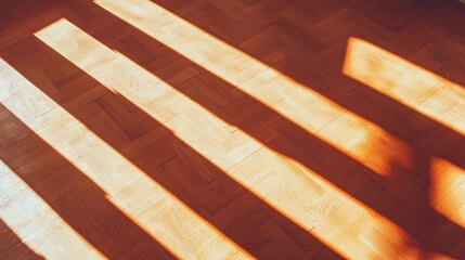 Warm golden-hour sunlight casting geometric shadows on a wooden plank floor, soft and calming natural tones