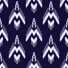 ikat pattern and fabric. Abstract background for wallpaper, textures, textile.