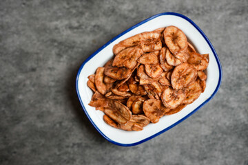Fried banana chips. Crispy banana chips. Thai fruit snack