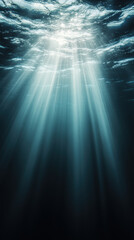Sunlight rays penetrating deep ocean waters creating mystical underwater scene with beams of light and dark shadows