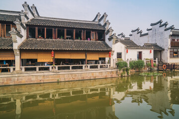 Fototapeta premium Old houses, rivers, and bridges in Zhouzhuang Ancient Town, Suzhou City, Jiangsu Province, China On April 18th, 2023