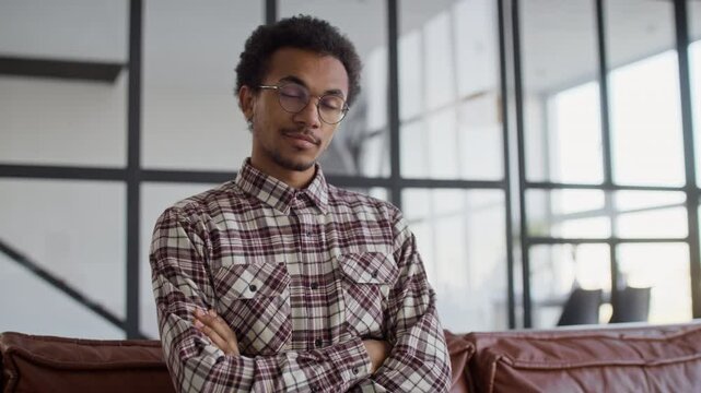 Confident young man with playful smirk