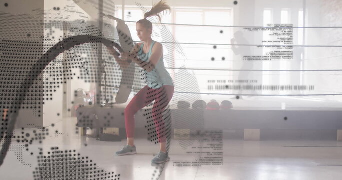 Image of data processing and globe over caucasian woman exercising at gym - Powered by Adobe