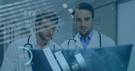 Image of data processing and diagrams over caucasian male doctors checking xray