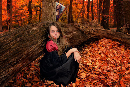 Teen girls dressed up for Halloween in colorful woods