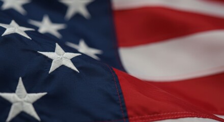 Fototapeta premium The American flag displays vivid red and blue colors, intricate stitching, and bright white stars