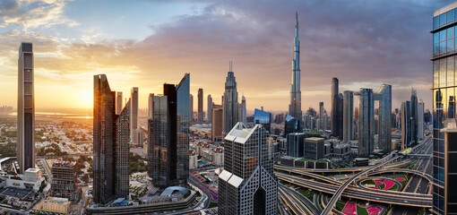 Dubai skyline at sunset with Burj Khalifa - aerial view, United Arab Emirates
