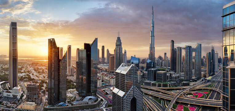 Dubai skyline at sunset with Burj Khalifa - aerial view, United Arab Emirates