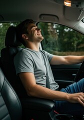 A man is driving a car and smiling, surrounded by lush green trees and a peaceful atmosphere