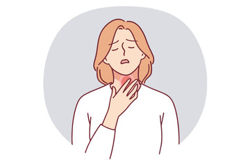 Woman experiencing a sore throat discomfort