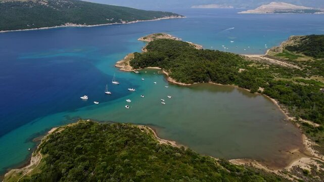 Rab Island With Lush Green Coast And Turquoise Sea In Croatia. aerial shot