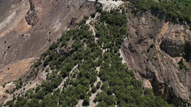 Aerial view of the steep path, which is the climbing route of Mount Papandayan which passes through the Dead Forest and Crater, flanked by mountain slopes that have collapsed due to the eruption.