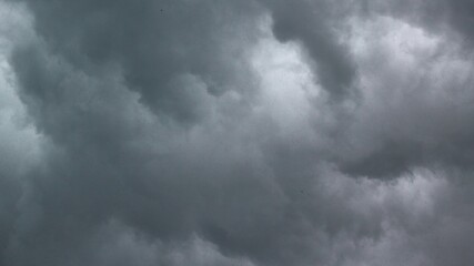 extreme weather looks like very dark clouds showing the dramatic dark side of the nature which changes from bright to cloudy