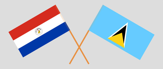 Crossed flags of Republic of Paraguay and Saint Lucia. Official colors. Correct proportion. Vector illustration