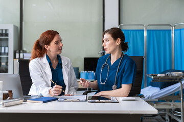 Fototapeta premium Healthcare professionals collaborating with technology for diagnosis.