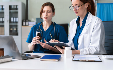 Diversity, medical team head leaders discuss results, brainstorming and planning.