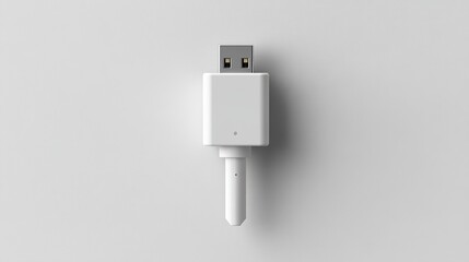 White USB Device on Light Gray Background