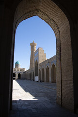 Fototapeta premium Bukhara, Uzbekistan - October 16, 2024: Kalyon Mosque look onto courtyard