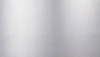 Brushed stainless steel surface reflecting light, industrial minimalism