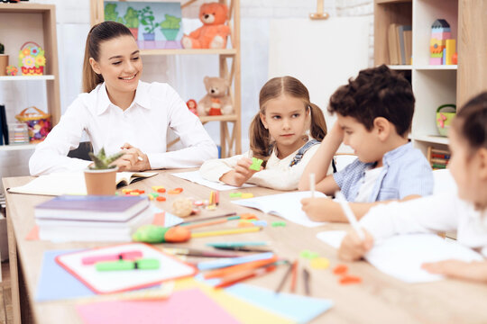 Children study letters in class at school.