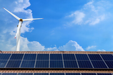 Close-up roof of smart modern home that installed solar panel and windmill for make solar energy...