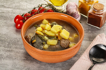 Soup with meatball and potato